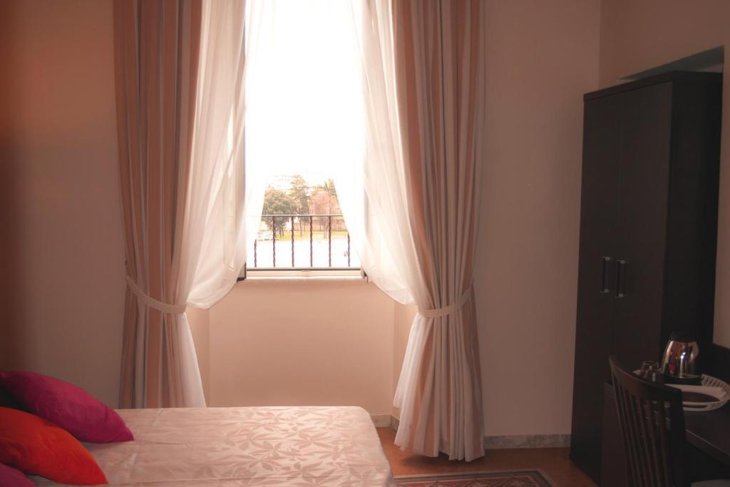 Laterani Suite Řím Pokoj fotografie